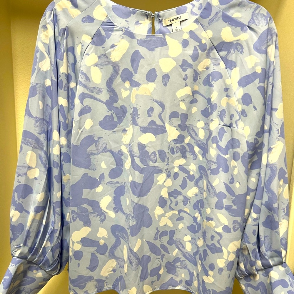 Periwinkle blouse. Size Large. Brand new. Never worn.